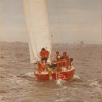 That’s me giving Chris Furey (who took the photo) a brown eye as for once I beat him in a J24 race. Mike Northwood (we shared ownership) is on the helm and the guy with the beard is “Mongel” – Ian Richards